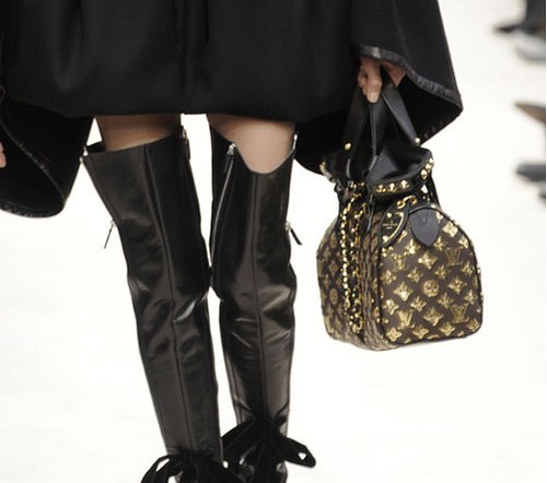 What is Parisian elegance - woman wearing Louis Vuitton clothing and accessories